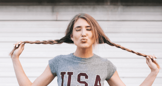 Woman practicing french kissing.