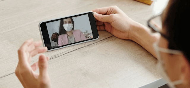 Long distance couple with a video chat app.